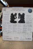 A boxed BabyBjorn Carrier One in black.