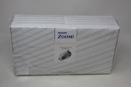 A boxed as new Philips Zoom! Chairside Light-Activated Whitening Kit (EXP: 12/2021).
