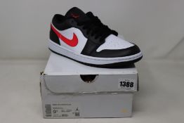 A pair of as new women's Nike Air Jordan 1 low (UK 7).