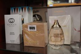 A Chloe Love Story eau de parfum (50ml), a Marc Jacobs perfum and shower gel gift set, a Chloe