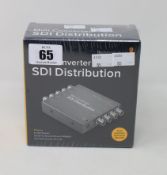 A boxed as new Black Magic Design mini converter SDI distribution.