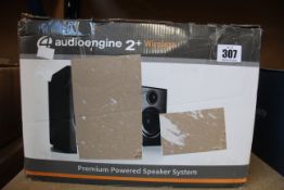 A pair of boxed Audioengine A2+BT Wireless Powered Speakers in white.