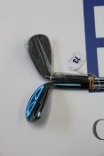 An as new Mizuno T20 56 10 chrome golf wedge and an as new Ben Hogan Equalizer black wedge (right