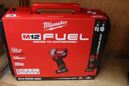 A boxed as new Milwaukee M12FIW38-622X Impact Wrench.