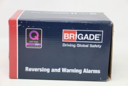 A boxed as new Brigade SA-BBS-107 A1400 White Sound Reversing Alarm (12-24Vdc - 87-107dB(A)).