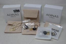 Five Adinas assorted jewellery in three original boxes to include earrings, pearl style necklace