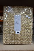 A pair of as new John Lewis & Partners Rona weave ochre eyelet curtains (RRP £180.00).