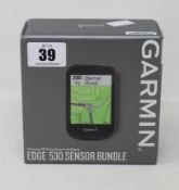A boxed as new Garmin Edge 530 Sensor Bundle.