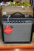 A boxed Fender Champion 20 Guitar Amplifier.