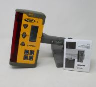 A boxed as new Spectra Precision CR700 combination laser receiver.