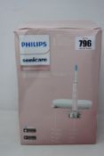 An as new Philips Sonicare 9000 Dimond clean electric toothbrush (Box unsealed and distressed).