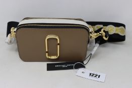 An as new Marc Jacobs Snapshot small camera bag.