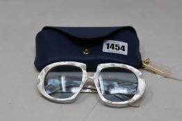 A pair of as new Loewe sunglasses.