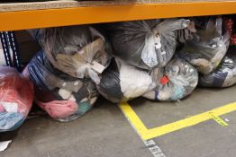 Nine bags of clothing and related items.