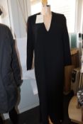 An as new Mark Kenly Domino Tan Demetra long V-neck dress with buttoning in black (Size 38).