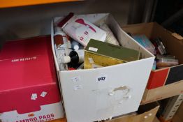 A box of assorted part used beauty items a box of nail clipper manicure sets and eyebrow razors, two