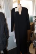 An as new Mark Kenly Domino Tan Demetra long V-neck dress with buttoning in black (Size 40).