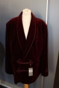 An as new Ede & Ravenscroft Est. 1689 Bloomsbury burgundy velvet blazer (Size 46 - RRP £795).