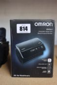 A boxed as new Omron Evolv Automatic Upper Arm Blood Pressure Monitor.