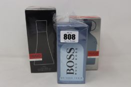 A Hugo Boss Deep Red women eau de parfum (90ml), a Hugo Boss Iced eau de toilette (125ml) and a Hugo