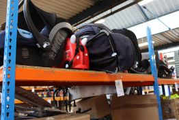 Five car seats/booster seats and a trunki suitcase.