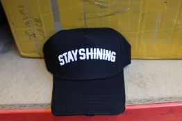 A quantity of as new Stay Shining baseball caps.