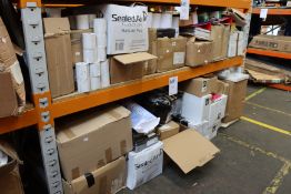 Two shelves of stationery to include notebooks, magnetic pens and other related items.