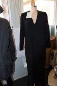 An as new Mark Kenly Domino Tan Demetra long V-neck dress with buttoning in black (Size 38).