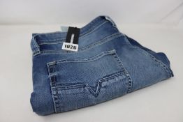 A pair of as new Diesel Larkee-Beex jeans (W32/L30).