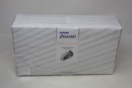 A boxed as new Philips Zoom! Chairside Light-Activated Whitening Kit (EXP: 12/2021).
