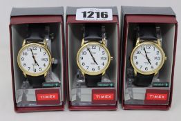 Three Timex men's classic black strap watches.