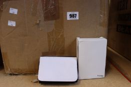 A large quantity of small unbranded purses (Approximately 120).