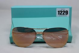 A pair of boxed as new Tiffany & Co 0TF3066 Tiffany T 61054Z - 62mm sunglasses.
