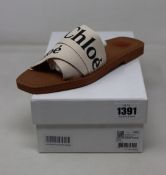 A pair of ladies boxed as new Chloe - Woody flat mule/slides in white canvas.