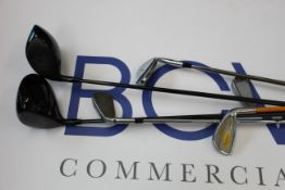 Six pre owned golf clubs in varying conditions to include a Mizuno T20 wedge, Patriot UK Young Gun 2