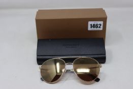 A pair of as new Burberry sunglasses.