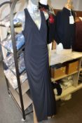An as new Adrianna Papell Jersey Halter beaded back dress in black (Size 8).