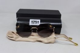 A pair of boxed as new BVLGARI Serpenti 0BV6099 - 20188G -57 sunglasses.