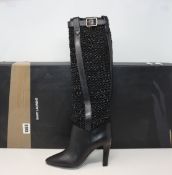 A pair of as new Saint Laurent Kim 90 boots in black (EU 35).