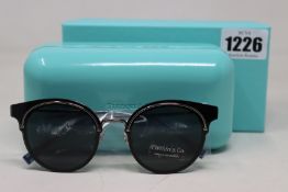 A pair of boxed as new Tiffany & Co 0TF3061 Gunmetal 60033F - 64mm sunglasses.