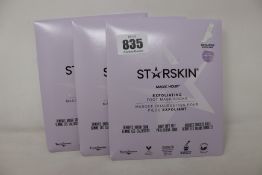 A large quantity of Starskin Magic Hour Exfoliating Foot Mask Socks (Approximately 70, ) along