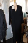 An as new Mark Kenly Domino Tan Demetra long V-neck dress with buttoning in black (Size 36).