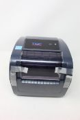 A boxed as new TSC TC200 bar code printer.
