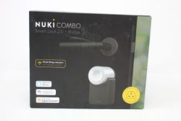A Nuki Combo Smart Lock 2 + Bridge.