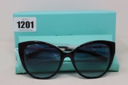 A pair of ladies boxed as new Tiffany & Co. Sunglasses (TF4166 80559S 55).