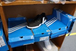 Four pairs of as new Adidas A.R. trainers (3 x UK 8.5, 1 x UK 9 - damage boxes).