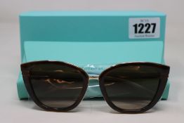 A pair of boxed as new Tiffany & Co TF 4152 Havana brown gradient 80153B - 55mm sunglasses.