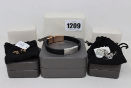 A boxed Emporio Armani men's stainless steel and leather bracelet (EG52637040), a boxed Emporio