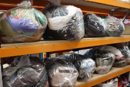 Nine bags of clothing and related items.