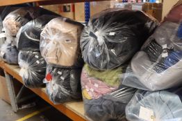 Twelve bags of clothing and related items.